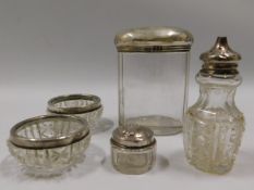 A Mappin & Webb silver topped jar & four other silver topped glass wares