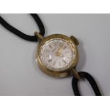A ladies Tudor wrist watch, glass scratched