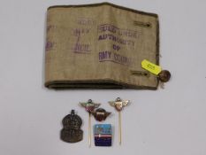 A silver ARP badge, an Army Council armband & othe