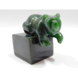 A green jade bear ornament, 2.5in tall