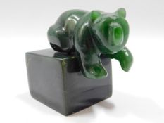 A green jade bear ornament, 2.5in tall