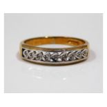 A 9ct gold ring set with diamonds, size P, 2.6g
