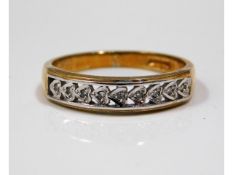 A 9ct gold ring set with diamonds, size P, 2.6g