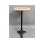 A cast iron table with marble top, 24in high x 12i