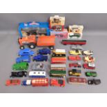 A quantity of mostly diecast toy vehicles includin