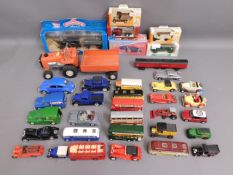 A quantity of mostly diecast toy vehicles includin