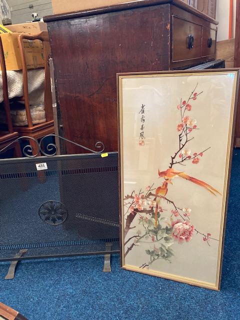 A small fire screen twinned with a modern Oriental print on silk