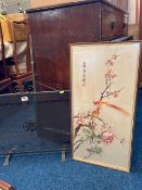 A small fire screen twinned with a modern Oriental print on silk