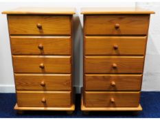 A pair of modern pine chests of five drawers, 36in