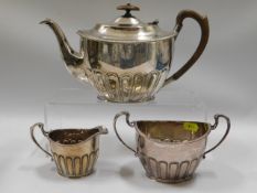 A silver plated tea set & three other pieces of pl