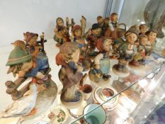 A collection of Goebel figures & a similar 1970's