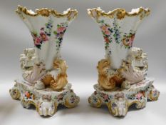 A pair of ornate mid 19thC. Paris porcelain cornuc