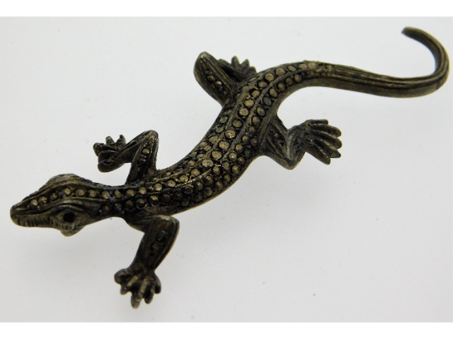 A white metal lizard brooch set with marcasite, 12