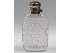 A silver topped cut glass scent bottle, 4.375in hi