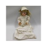 An antique porcelain headed doll, stamp B5, 15.5in