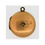 A 9ct gold antique locket, some dents, set with pe