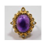 A 9ct gold ring set with amethyst & pearl, 7.2g