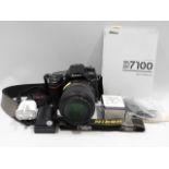 A Nikon D7100 digital SLR camera with 105mm macro