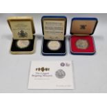 Three Royal Mint silver proof crowns and a silver