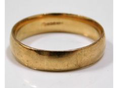 A 9ct gold band, 5.3g, size Z+