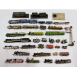 A quantity of miniature card trains & a signal