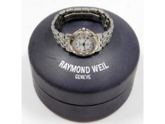 A ladies Raymond Weil 5360 Tango wristwatch & case