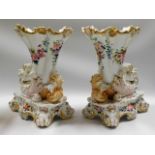 A pair of ornate mid 19thC. Paris porcelain cornuc