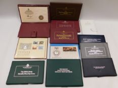 Twelve silver proof crown & coin covers including