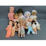 A quantity of 15 mixed dolls including Fisher Pric