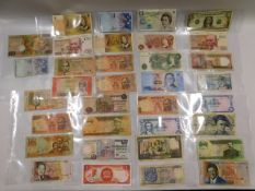 An album collection of mixed bank notes including