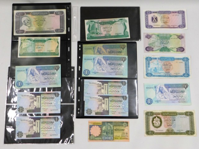 A quantity of sixteen Libyan bank notes including