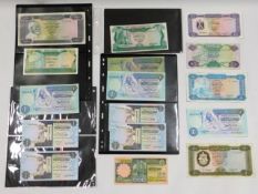 A quantity of sixteen Libyan bank notes including