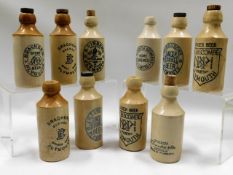 A selection of ten vintage stoneware ginger beer b