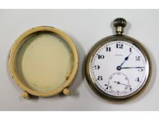 A Rolex top wind pocket watch with stand, runs whe