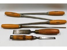 Two wooden handled chisels twinned with four wooden handled draw pins