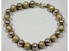 A sterling silver beaded bracelet, 9.9g, 7.5in lon