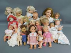 A quantity of 24 mixed dolls including Playmates &