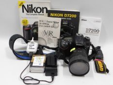 A Nikon D7200 digital SLR camera with 24-120mm len