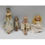 Four antique dolls including German