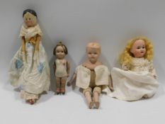 Four antique dolls including German
