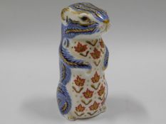 A Royal Crown Derby squirrel paperweight, gold sto