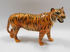 A vintage Beswick pottery tiger, 11.5in long x 7.5