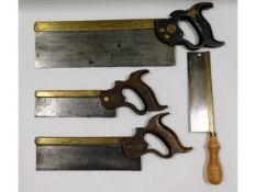 Four brass spined hand saws including two Henry Di