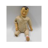 An Oriental man doll with composite head, lacking