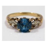 A 14ct gold ring set with zircon & 10ct mounted di