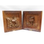 A pair of vintage heavy carved oak plaques with ha