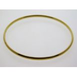 A 9ct gold bangle, internal diameter 56mm, 11.6g