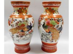 A pair of Japanese Kutani vases with bird & gilded