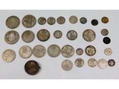 A quantity of pre-1947 white metal coins & a mount