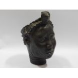 A Benin Bronze bust of woman, 8.5in tall